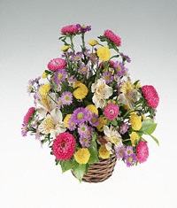 Basket of mixed bright flowers
