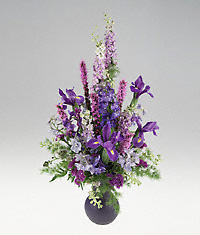 Blue and purple flowers in a vase