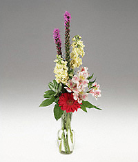 A small vase of blossoms
