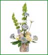 Blue and white flowers arranged in a ceramic container. Also available in pink and white for a girl. Specify pink or blue in 