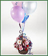 A bouquet of gerbera, carnations, spray roses and daisy spray mums with 4  multi colored latex balloons attached.(latex balloons are not suitable for hospital delivery)