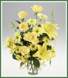A vase of yellow asiatic lilies, roses and daisy spray mums.