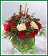 Send this bouquet of holiday colors - white roses, red carnations and Christmas greens - to express your happiest holiday wishes. Arranged in a 5