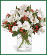 Snowy white alstroemeria and red hypericum berries are an elegant way to send your special greetings. Arranged in a glass vase, this bouquet is certain to be a classic and welcome addition to the season's festivities.