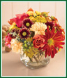 Dreamy days - dreamy colors! Autumn is for enjoying all the wonderful warm tones of the harvest and falling leaves. We've captured many of them in this bouquet - red rovers, deep orange roses, butterscotch carnations, golden yellow roses. All these and more are arranged in a 5