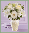 Beautiful flowers. Beautiful sentiment. Gorgeous bride! This bouquet of pure white flowers is an expression of true love when paired with our classically designed white ceramic vase. Vase is finished with a delicate golden pattern. A wonderful keepsake gift for a wedding, rehearsal dinner or bridal shower.